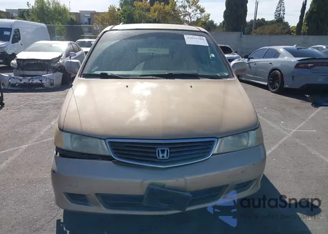 2001 Honda Odyssey Ex z USA, uszkodzony, nr VIN 2HKRL18661H572031